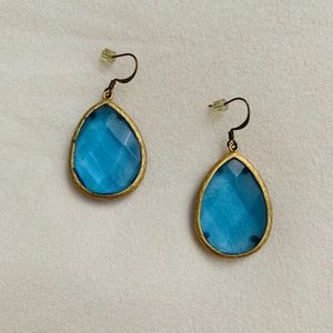 Teardrop blue gemstone earrings with gold lining